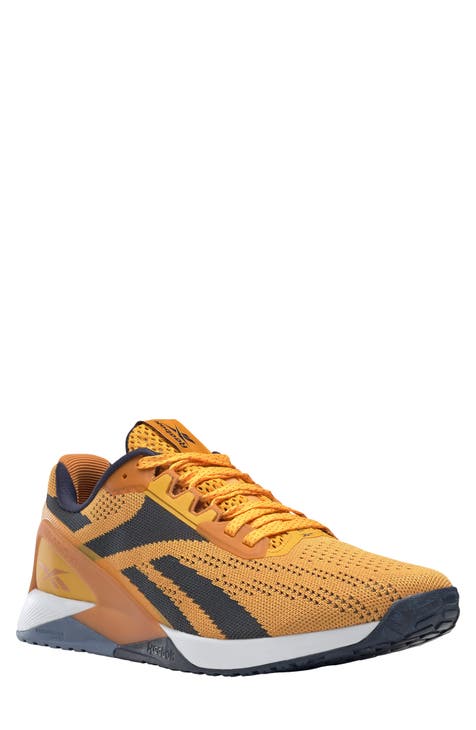 navy and yellow sneakers