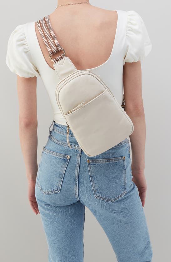 Shop Hobo Cass Leather Sling Bag In Ivory