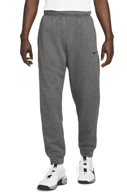 Shop Nike Therma-fit Tapered Training Pants In Heather/dark Grey/black