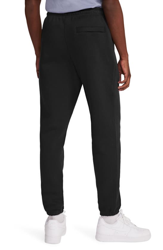 Shop Nike Club Fleece Sweatpants In Black/ Safety Orange