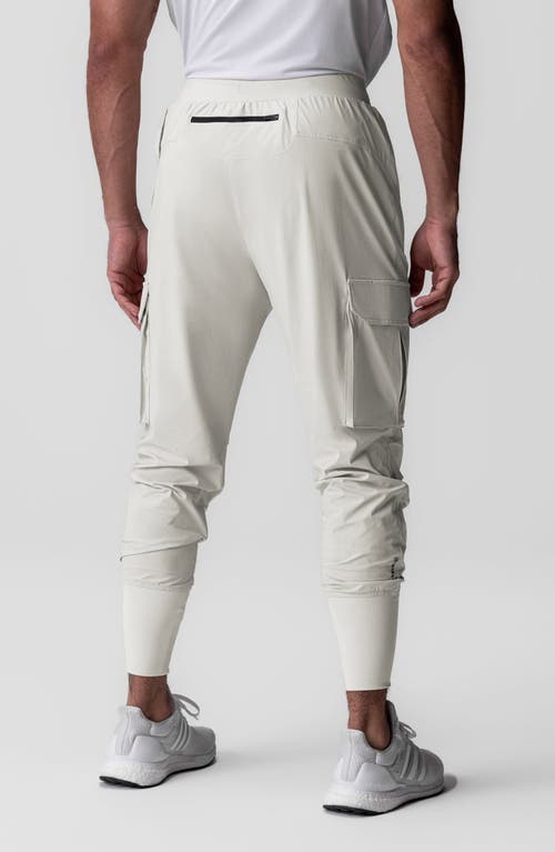 Shop Asrv Tetra-light Cargo Joggers In Stone Reflective