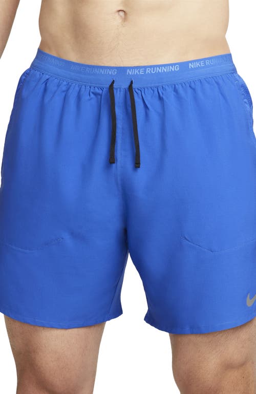 Shop Nike Dri-fit Stride 7-inch Brief-lined Running Shorts In Game Royal/black