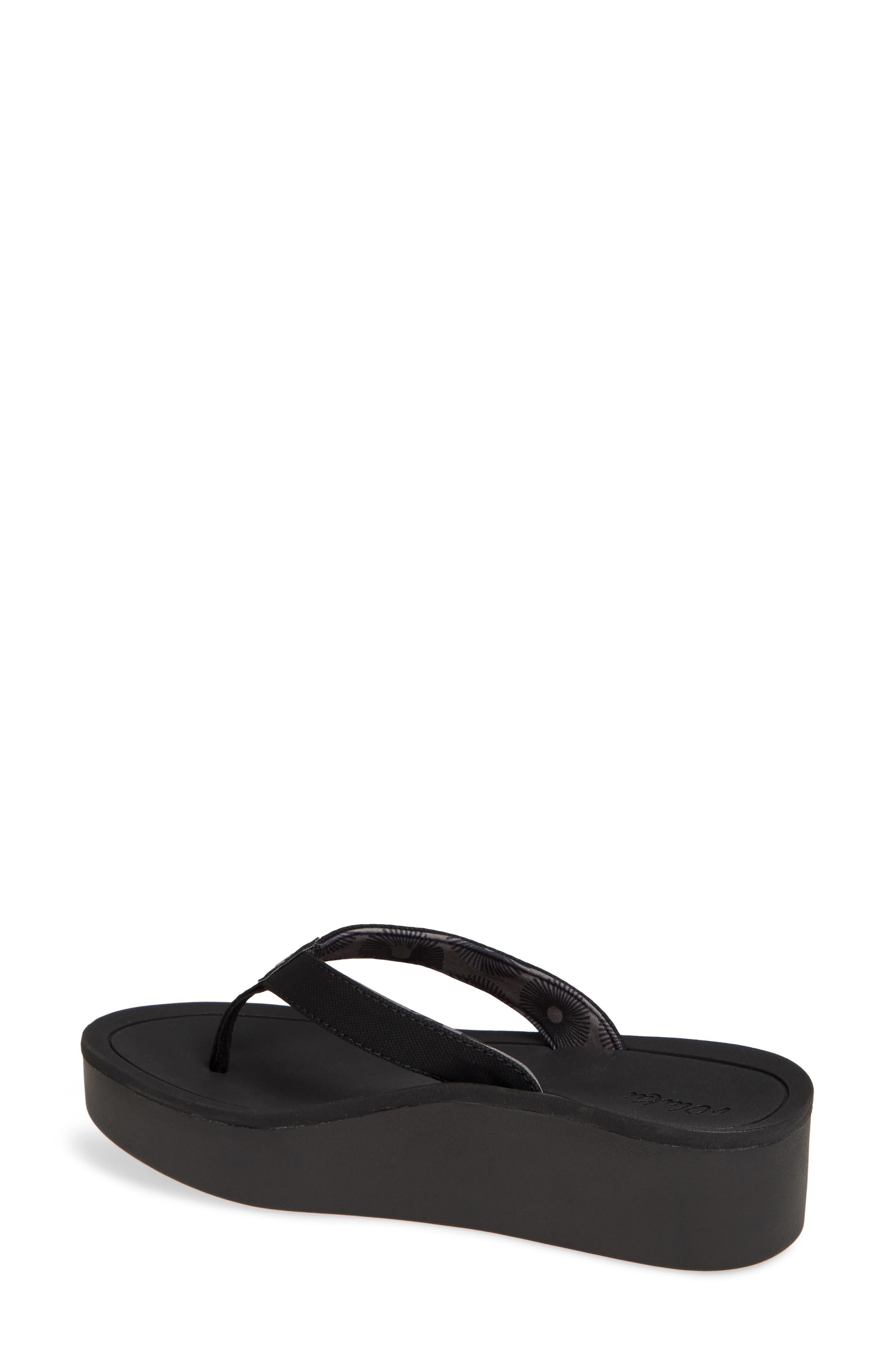 black platform flip flops