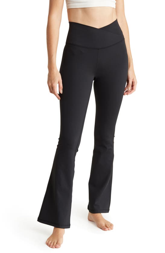 Yogalicious Lux Madison Crossover Flared Leggings In Black | ModeSens