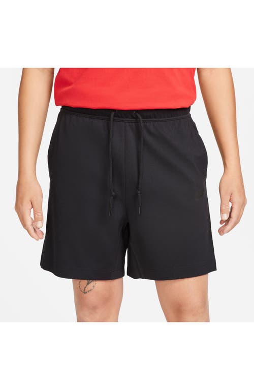 Shop Nike Lightweight Tech Knit Shorts In Black/black