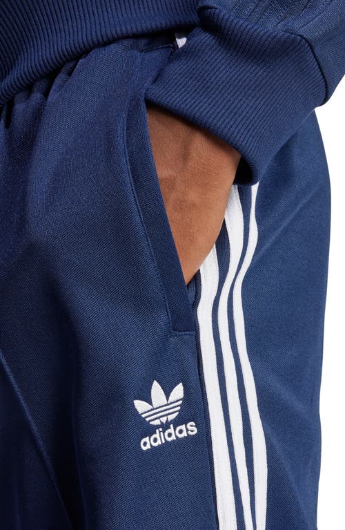 Shop Adidas Originals Adicolor Firebird Baggy Fit Track Pants In Night Indigo