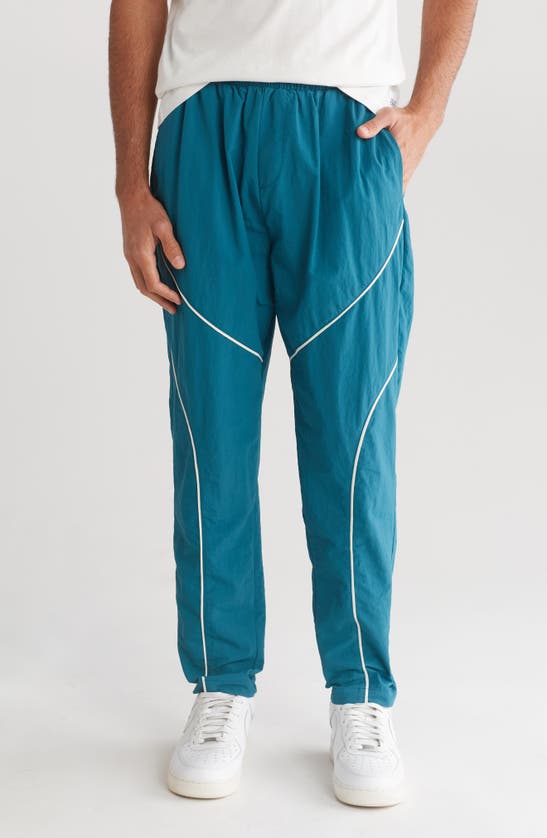 Shop Native Youth Piped Track Joggers In Blue