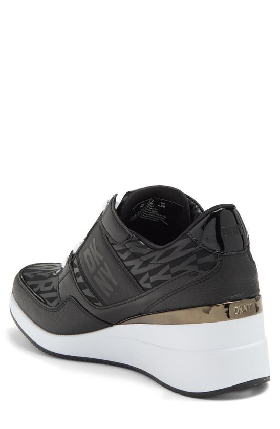 Shop Dkny Posie Wedge Sneaker In Black/ Black