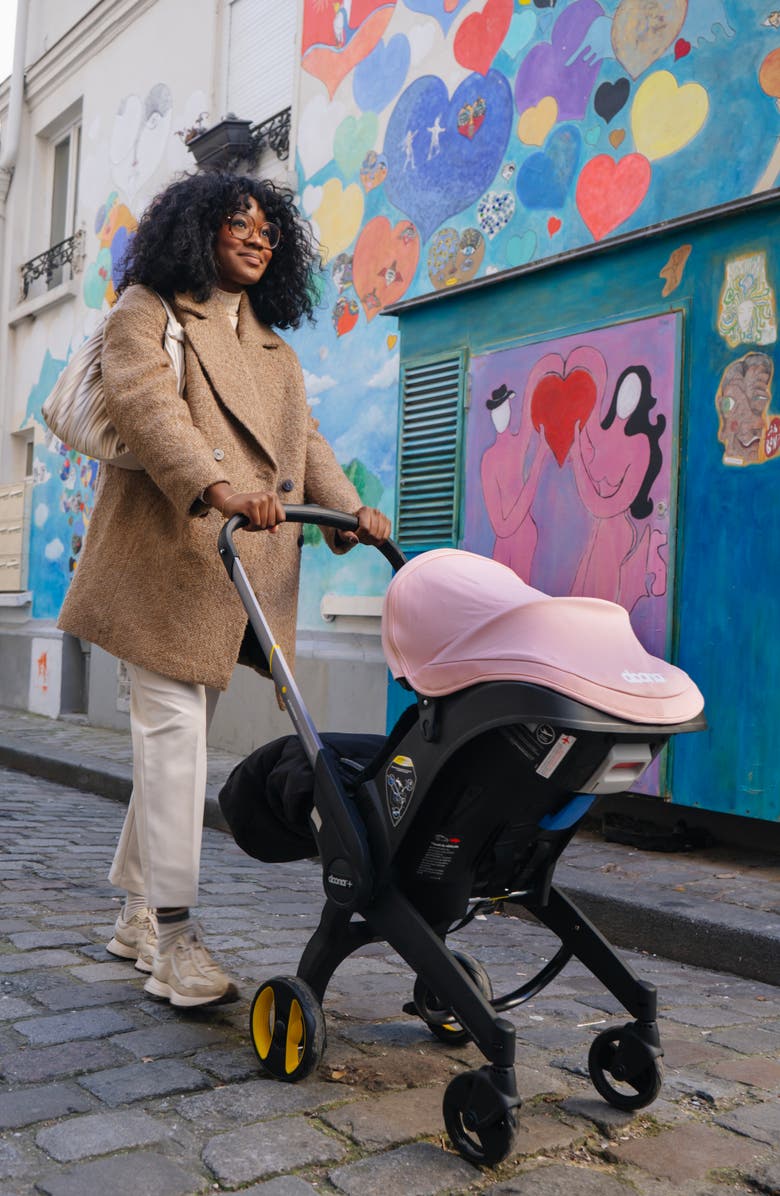 Doona Convertible Infant Car Stroller System with Base