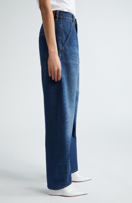 Shop Victoria Beckham Twisted Seam Slouchy Jeans In Dark Vintage Wash