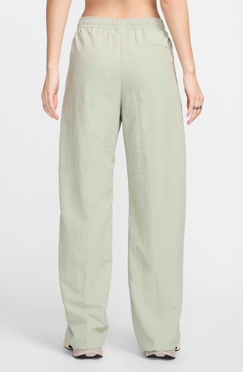 Shop Nike Wide Leg Pants In Jade Horizon/sail