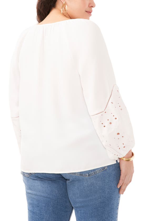 Shop Vince Camuto Eyelet Accent Split Neck Top In Ultra White