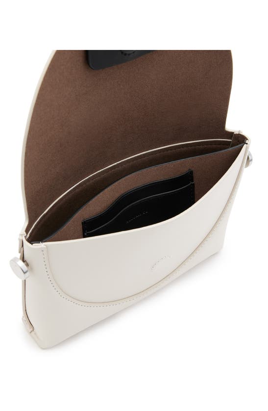 Shop Allsaints Francine Leather Crossbody Bag In Desert White