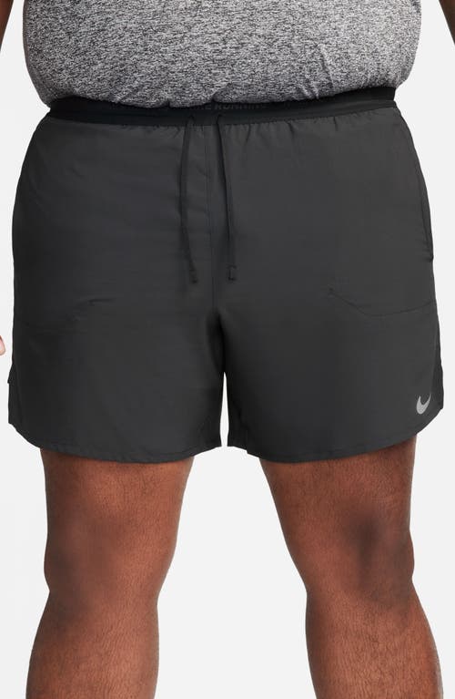 Shop Nike Dri-fit Stride 2-in-1 Running Shorts In Black/black/silver