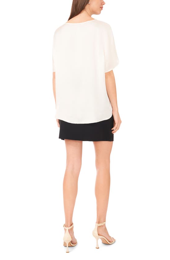 Shop Vince Camuto High-low Baggy T-shirt In New Ivory 103