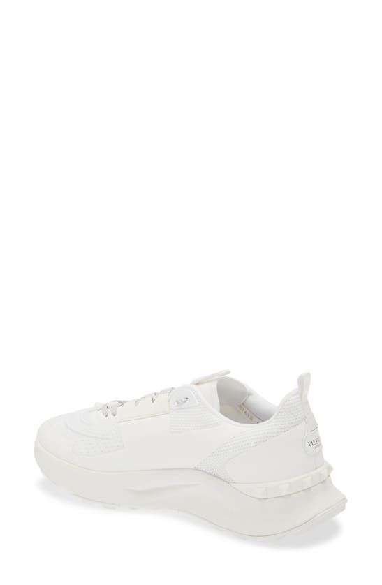 Shop Valentino Garavani Rockstud Knit Sneaker In Bianco