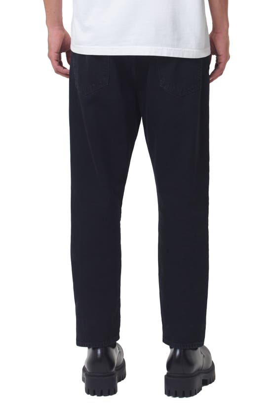Shop Agolde Curtis Relaxed Tapered Jeans In Crushed