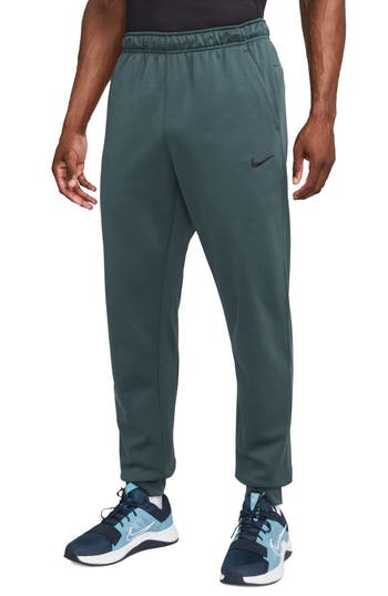 Nike Therma-fit Tapered Training Pants In Green