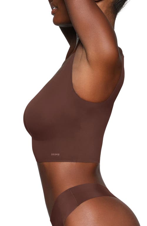 Shop Skims Naked Wireless Scoop Longline Bra In Cocoa