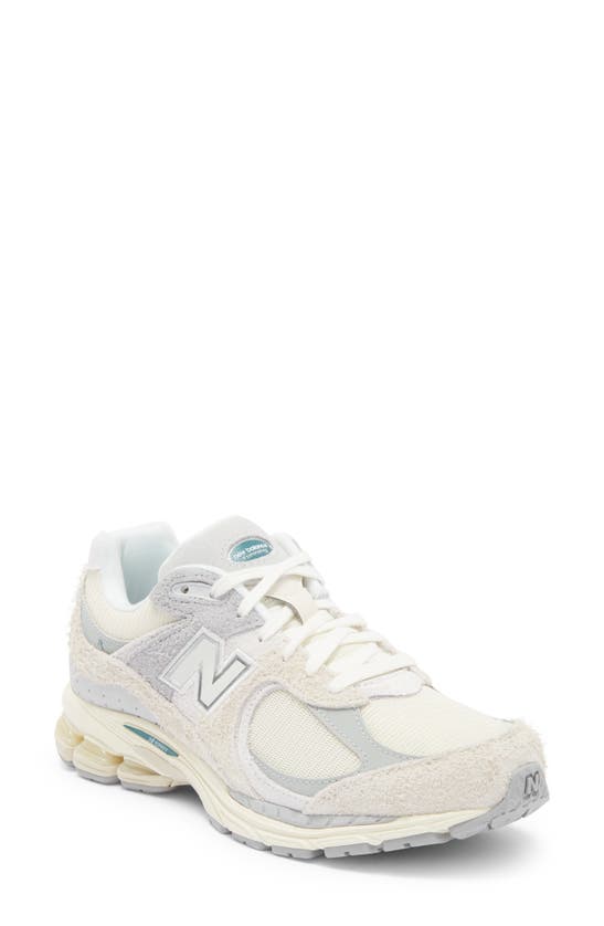 Shop New Balance 2002r Sneaker In Linen/ Concrete