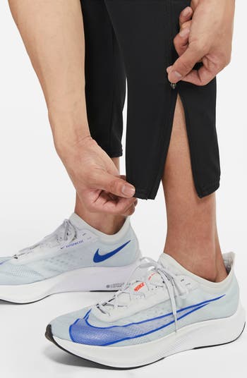 Nike Challenger Track Club Men's Dri-FIT Running Pants.