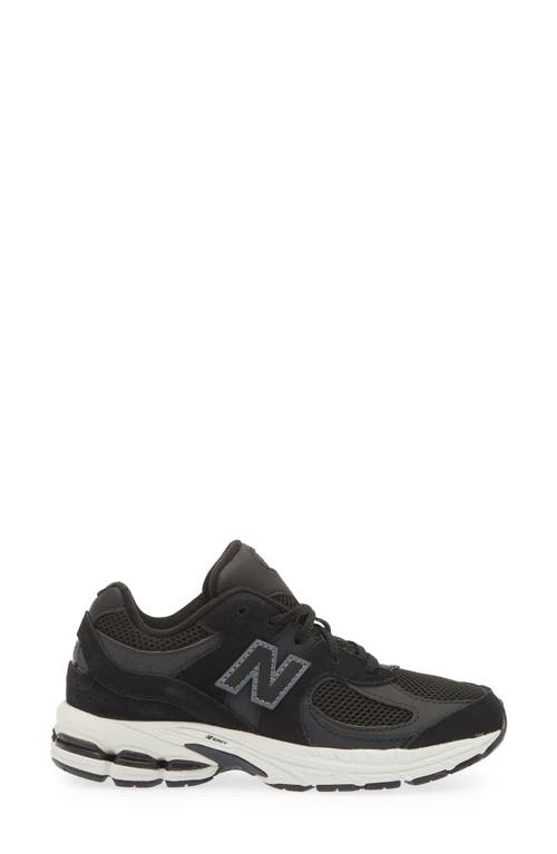 Shop New Balance Kids' 2002 Sneaker In Black/phantom