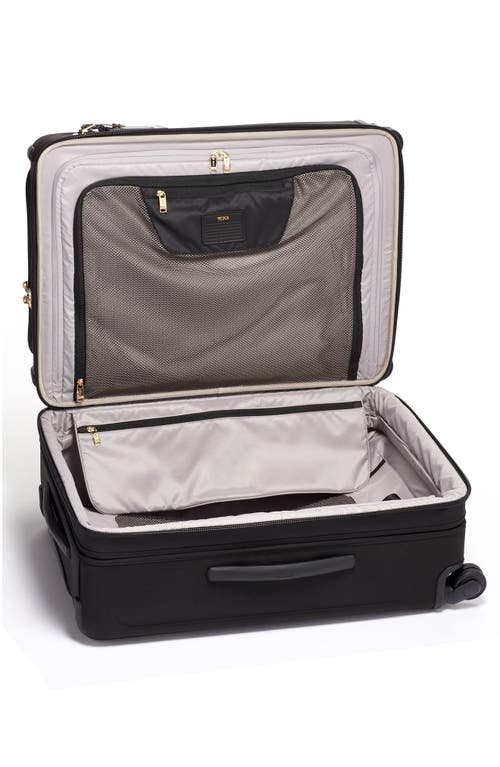 Shop Tumi Short Trip 26-inch Expandable 4-wheel Packing Case In Black/gold