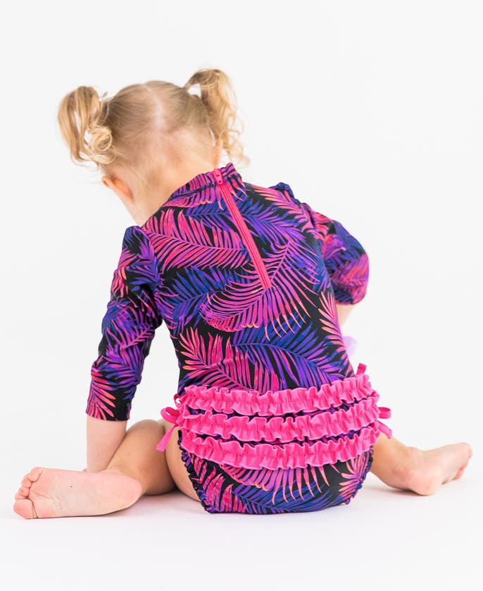 Shop Rufflebutts Baby Girls Long Sleeve Upf50+ One Piece Rash Guard In Marine Glow