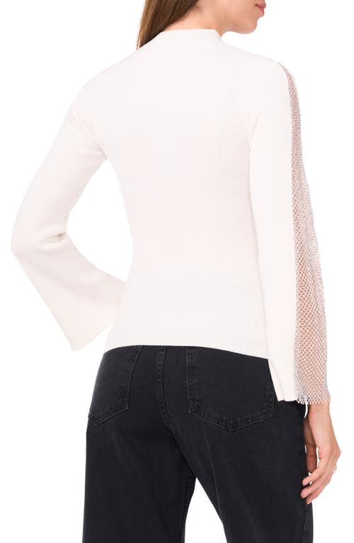 Shop Vince Camuto Rhinestone Rib Mock Neck Knit Top In New Ivory