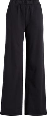Beyond Yoga On The Go Wide Leg Flare Pants In Toffee