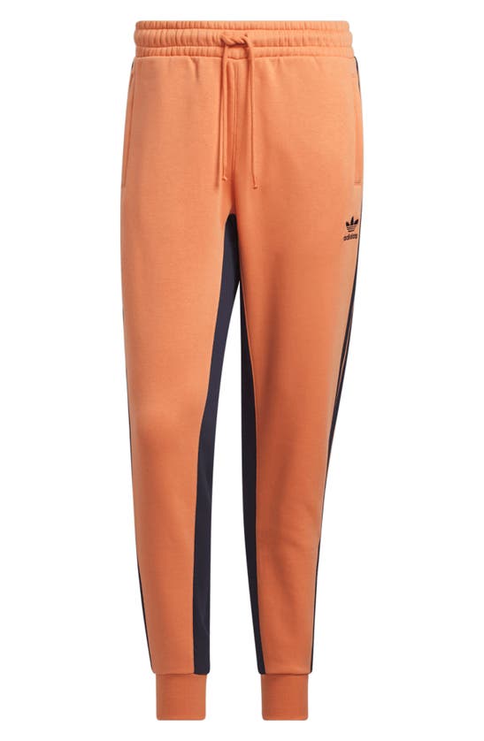 Adidas Originals Sst Fleece Track Pants In Hazy Copper/ Legend Ink ModeSens