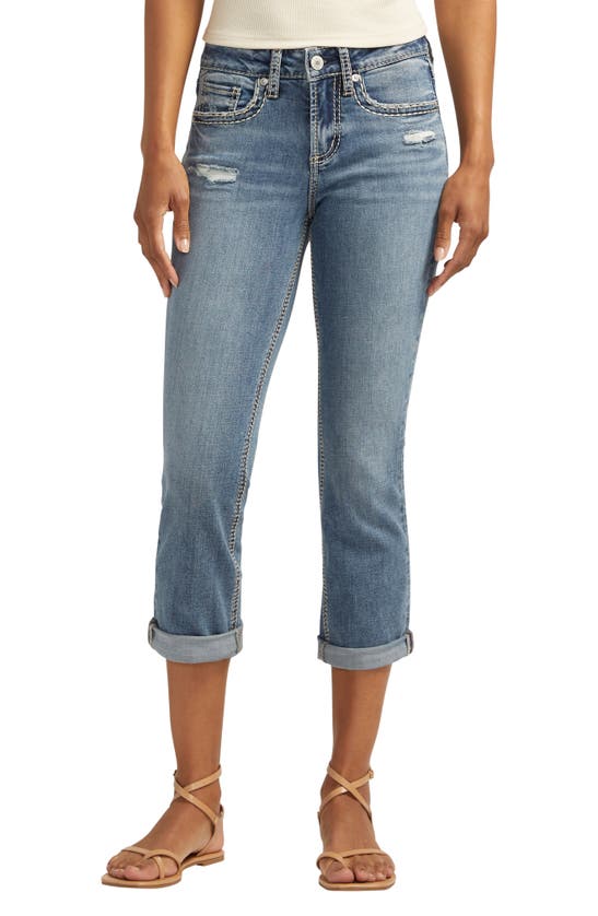 Shop Silver Jeans Co. Suki Curvy Fit Ripped Mid Rise Capri Jeans In Indigo