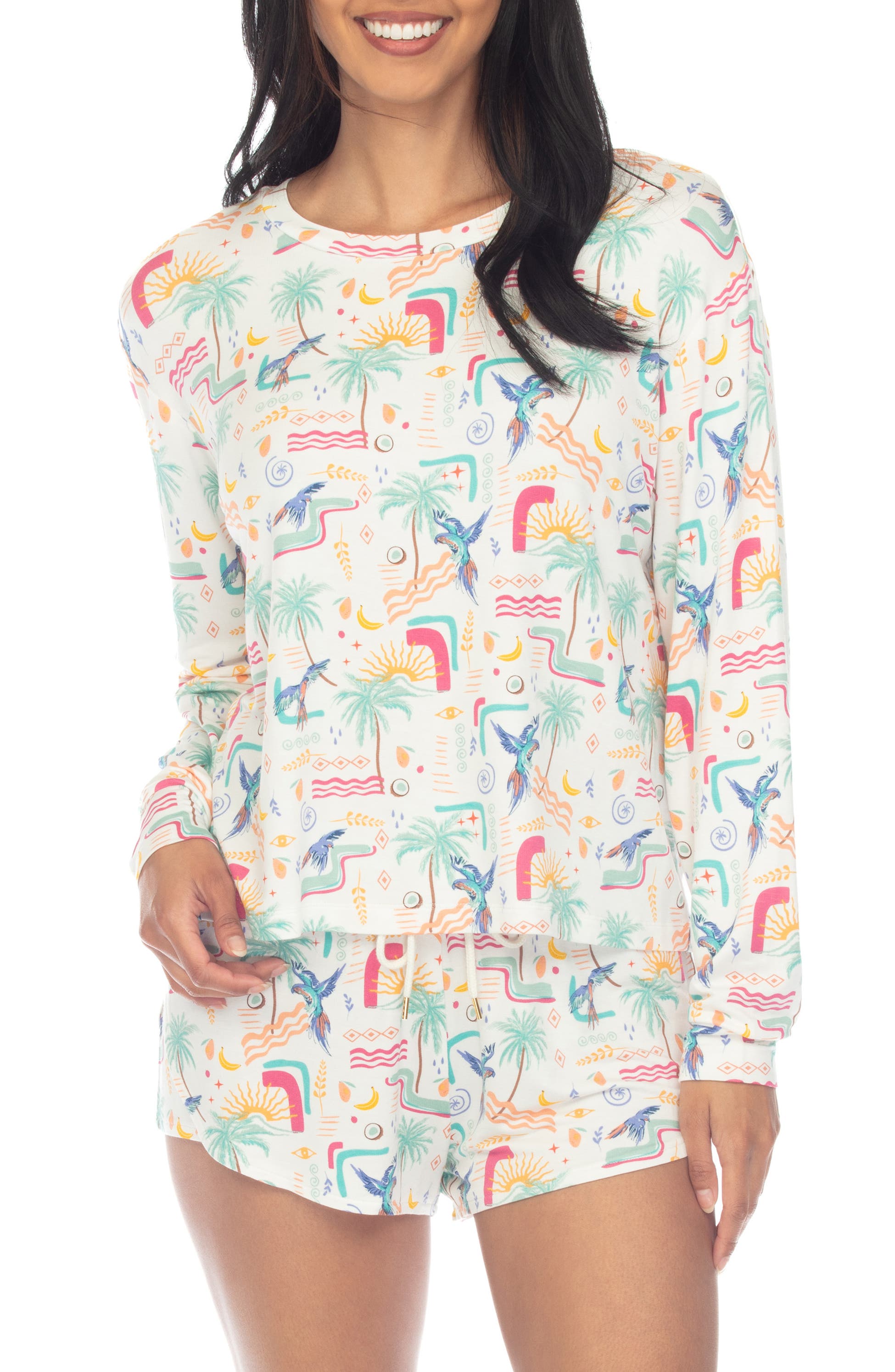 Model wearing the Play It Cool short pajamas in multicolor tropical print