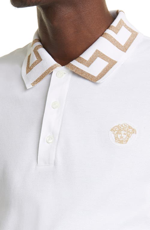 Shop Versace Metallic Greca Collar Piqué Polo In White/gold