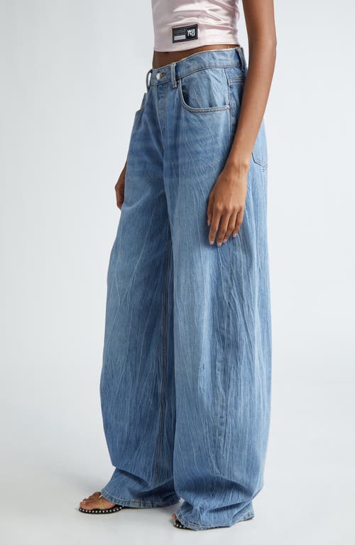 Shop Alexander Wang Low Rise Oversize Rounded Leg Jeans In Vintage Light Indigo