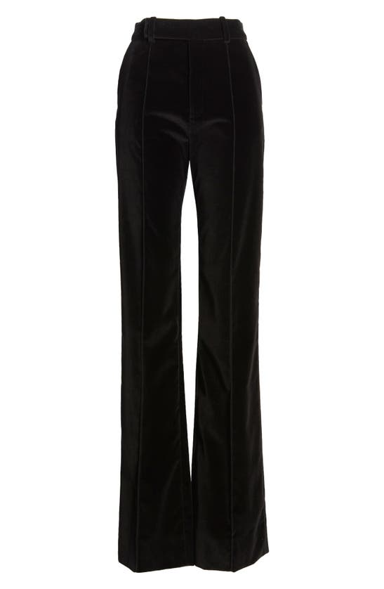 Shop Frame The Slim Stacked Velvet Trousers In Black