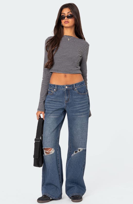 Shop Edikted Debbie Ripped Low Rise Wide Leg Jeans In Indigo-blue-raw-wash