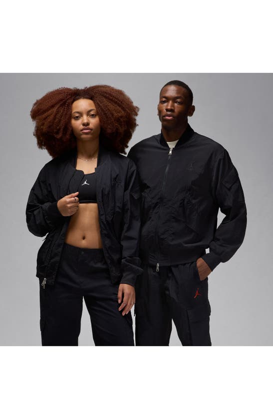 Shop Jordan Essentials Lightweight Nylon Renegade Jacket In Black