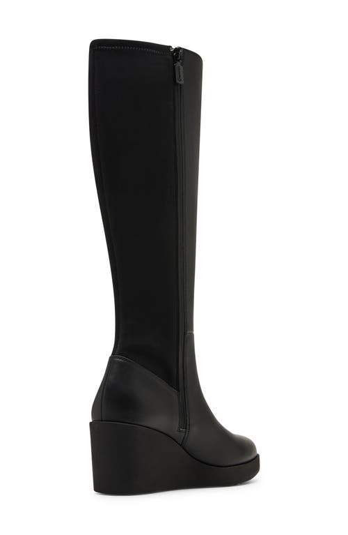 Shop Blondo Monique Waterproof Wedge Boot In Black Leather/stretch