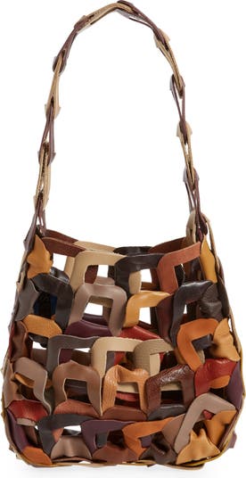 MAIMOUN, 🔗 𝓢𝘾103 ONLINE. Signature Links TOTES are here. Made from  up-cycled intertwined leather in metallic colorways. 🍬🪢