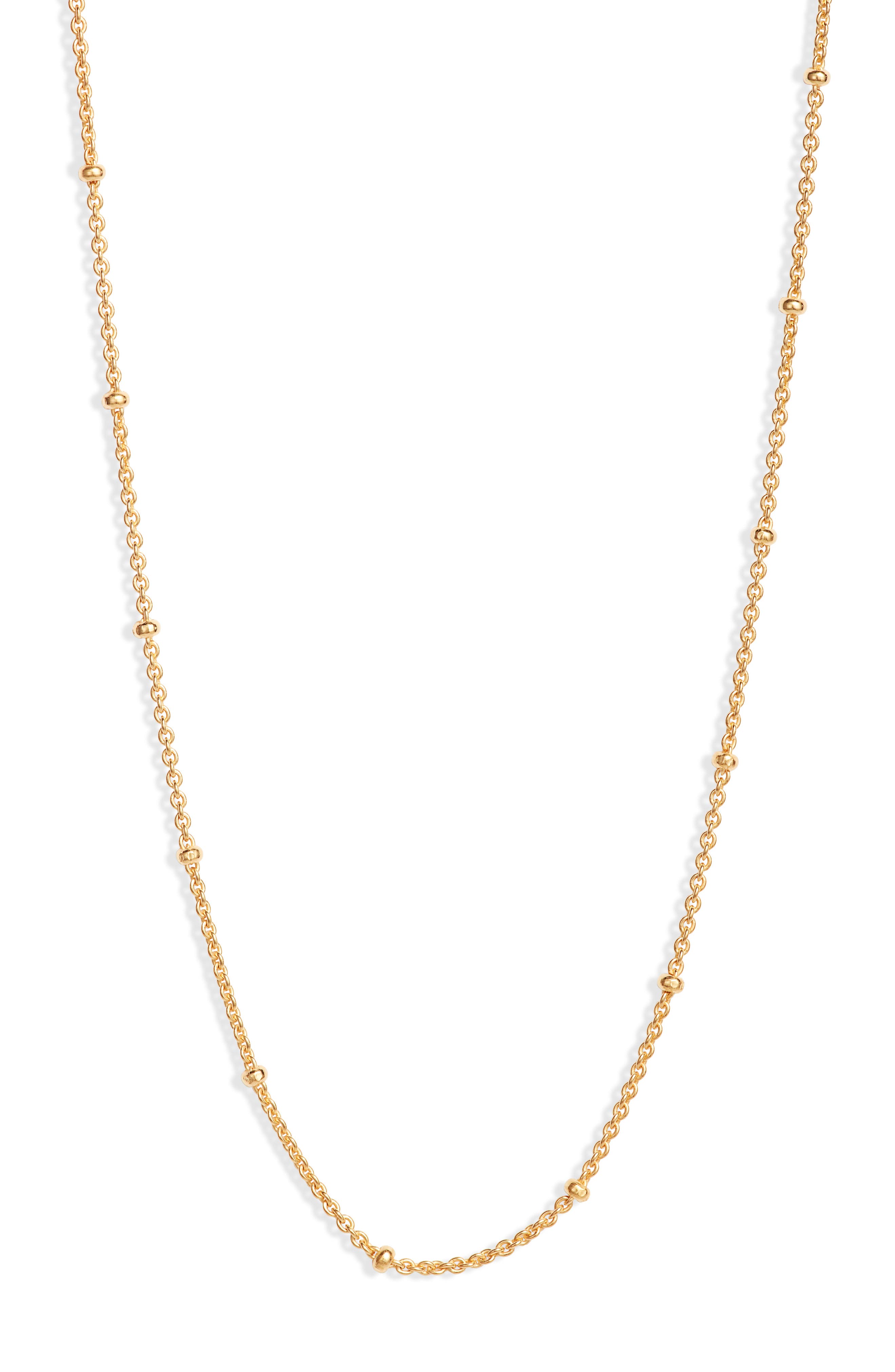 gold necklace with small gold beads