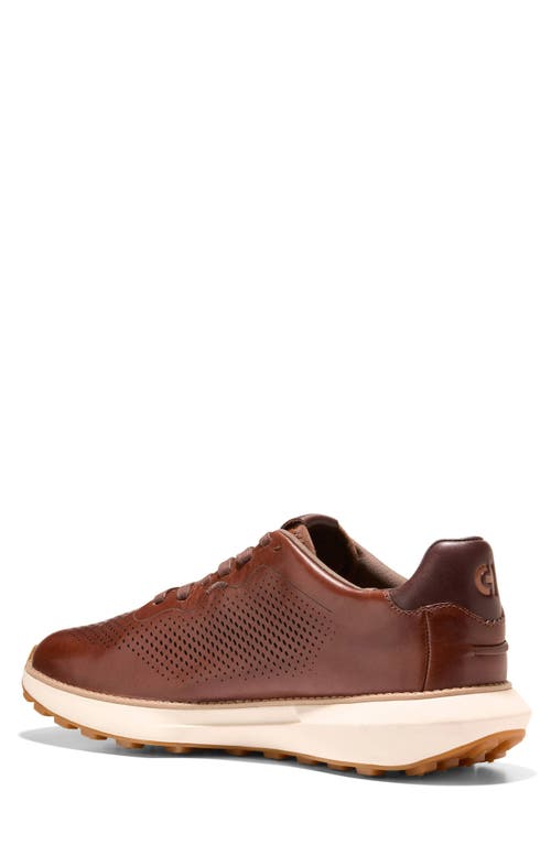 Shop Cole Haan Grandpro Ashland Laser Perforated Sneaker In Acorn/madeira/ivory