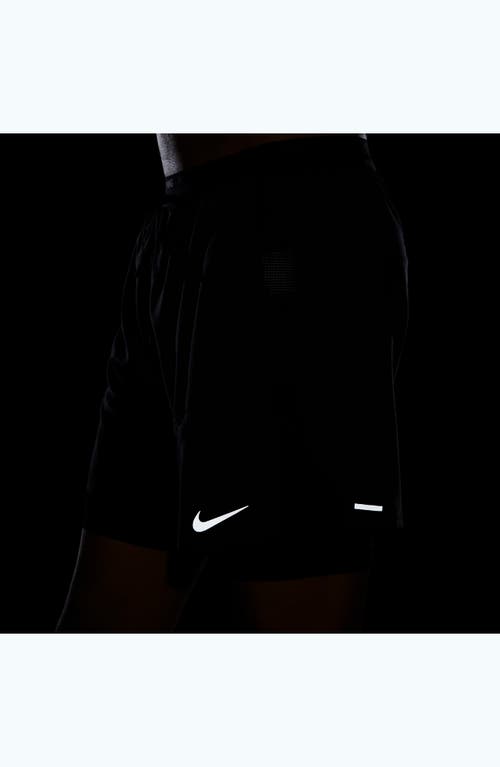 Shop Nike Dri-fit Stride Hybrid Running Shorts In Black/black/black