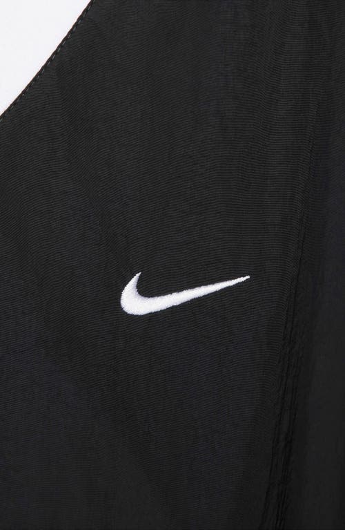 Shop Nike Sportswear Essential Woven Top In Black/white