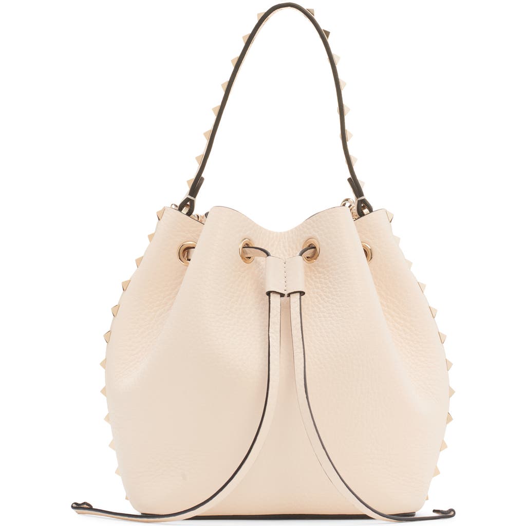 Shop Valentino Garavani Rockstud Leather Bucket Bag In Light Ivory