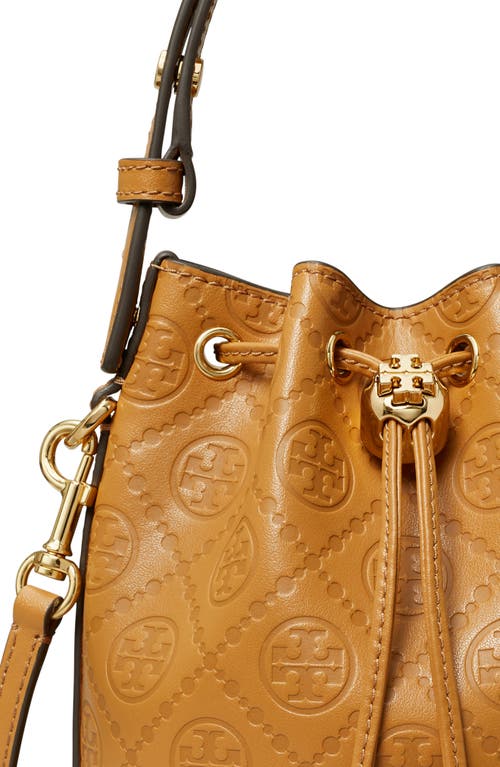 Shop Tory Burch Mini T Monogram Debossed Bucket Bag In Tan