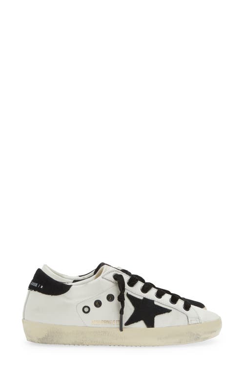 Shop Golden Goose Super-star Low Top Sneaker In White/black