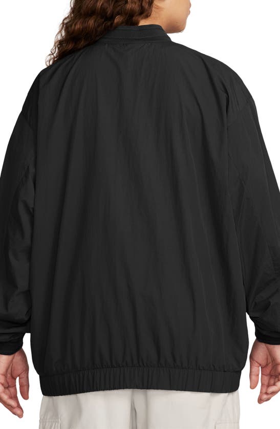 Shop Nike Solo Swoosh Wind Pullover Jacket In Black/ White
