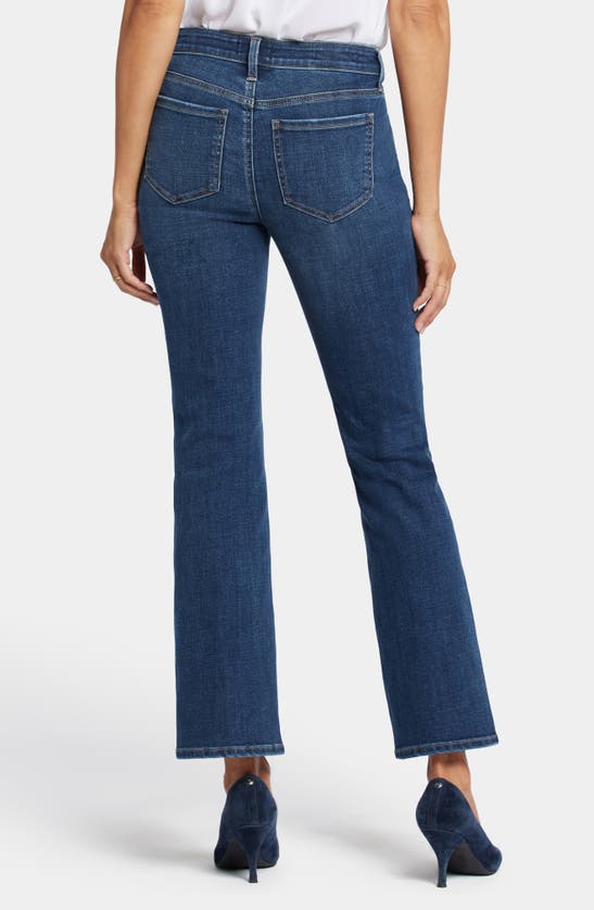 Shop Nydj Barbara Side Slit Bootcut Jeans In Olympus