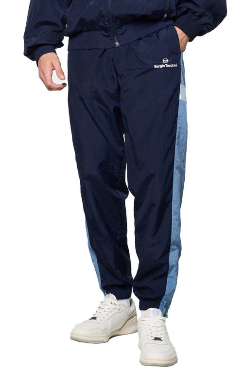 Shop Sergio Tacchini Angolo Zip Cuff Crinkle Nylon Track Pants In Maritime Blue